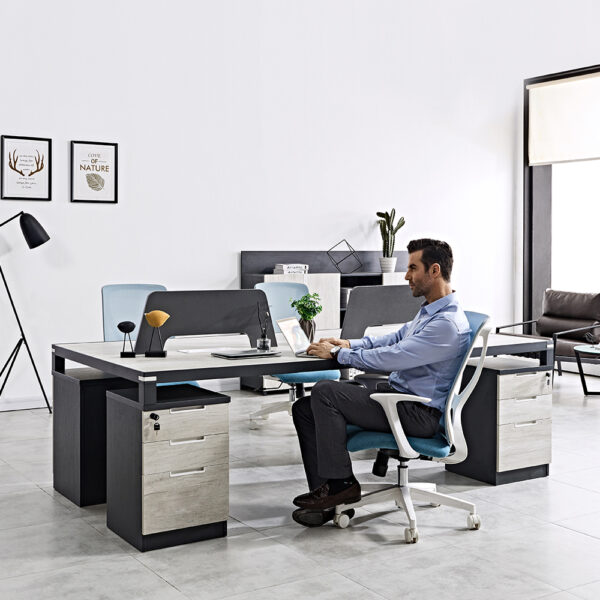 I shaped 4 seater office workstation desk with cabinet and drawers in black and white color